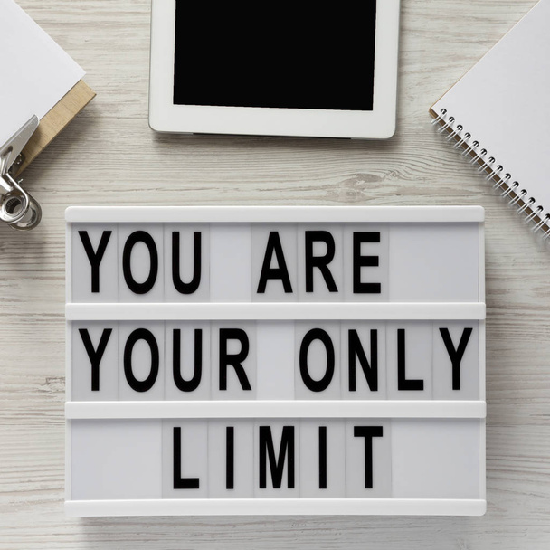 'You are your only limit' words on a modern board, clipboard wit - Photo, Image