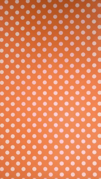 orange color background with white dots  - Photo, Image