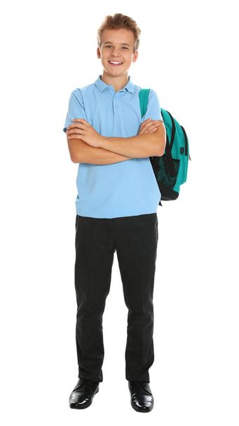 Happy boy in school uniform on white background - Foto, imagen