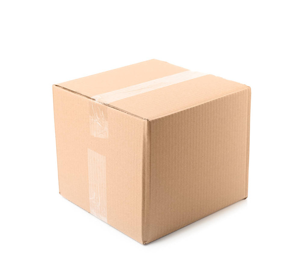 Closed cardboard box on white background. Mockup for design - Foto, afbeelding