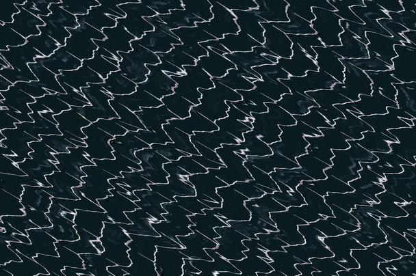 Modèle de lignes ondulées - argent élégant sur noir
. - Photo, image