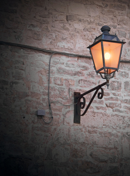 Street-lamp on brickwall. - Photo, Image