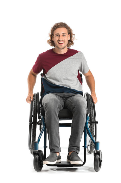 Handsome man in wheelchair on white background - Fotografie, Obrázek