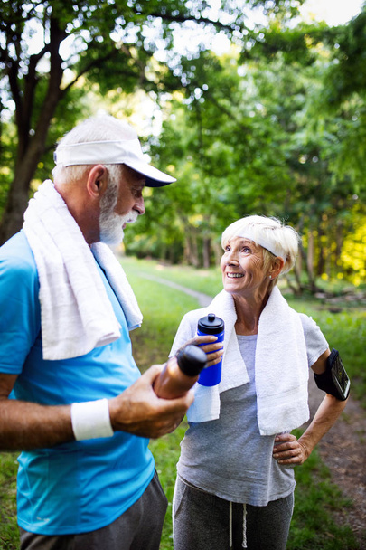 Happy senior people couple exercising for healthy life - Foto, Bild