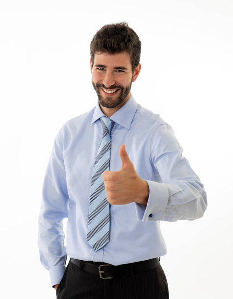Half-length portrait of confident handsome caucasian businessman in fashion modern formal wear suit showing happy thumb up gesture. Isolated in white. Concept of People leadership and success. - Zdjęcie, obraz