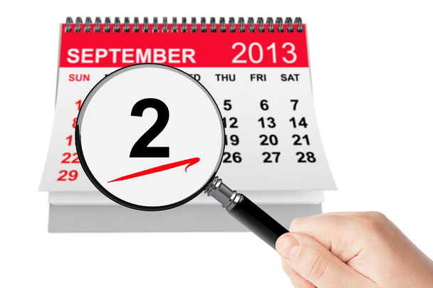 Concepto del Día del Trabajo. 2 septiembre 2013 calendario con lupa
 - Foto, imagen