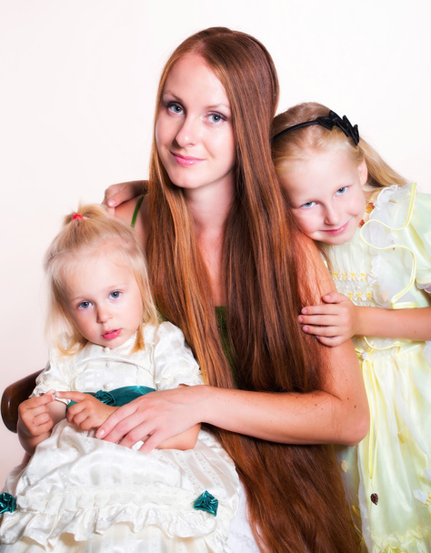 Mother with two daughters - Фото, изображение