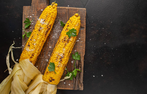 fresh corn on a wooden background - Photo, Image