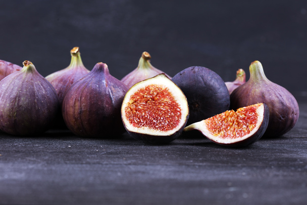 Fresh figs. Food Photo. whole and sliced figs on beautiful rusti - Photo, Image