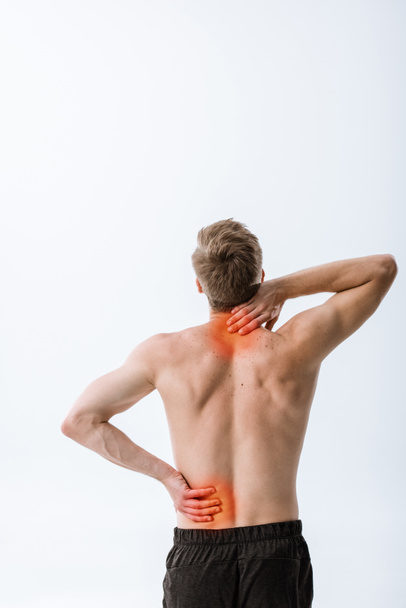 pohled na širý sportovec s bolestí krku a zad izolovaný na šedé - Fotografie, Obrázek