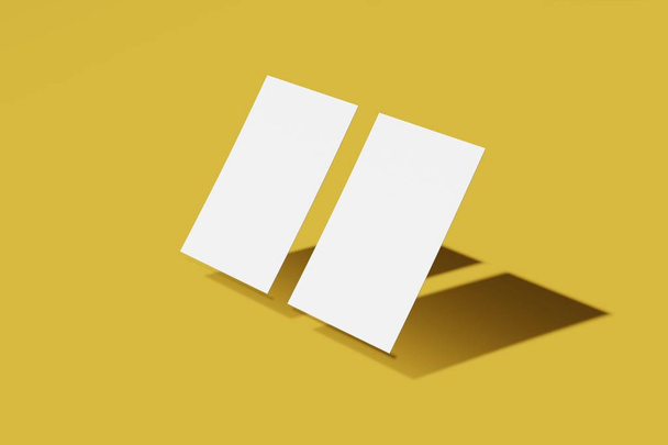 Dos Mockup en blanco de negocios o tarjeta de nombre sobre un fondo amarillo. Renderizado 3D
 - Foto, Imagen