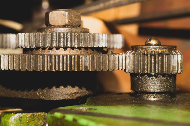 Gears of industrial machine. detail of mechanism. old cogwheels of machinery - Photo, Image