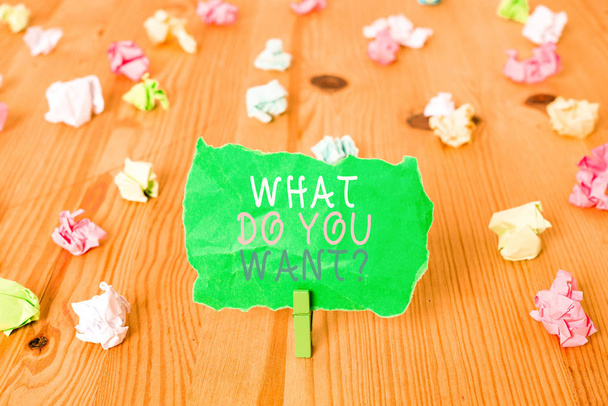 Word writing text What Do You Want Question. Business concept for say or write in order to ask demonstrating about something Colored crumpled papers empty reminder wooden floor background clothespin. - Photo, Image