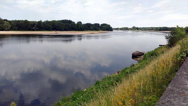 Loire river on a cloudy day in rural area, France - Photo, Image