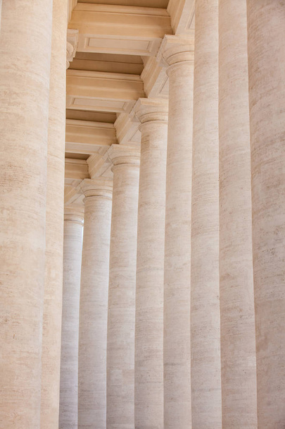 Detail of the beautirul Doric colonnade at St. Peter Square on the Vatican City in Rome - Zdjęcie, obraz