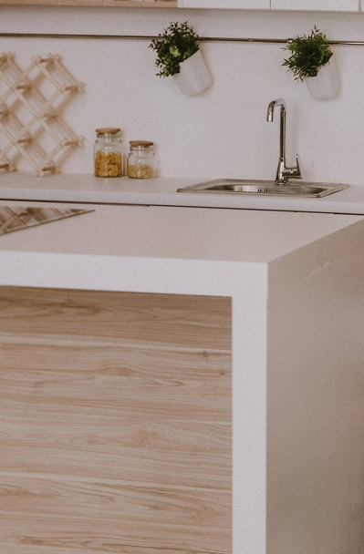 interior kitchen design table cutlery beige tone - Foto, afbeelding