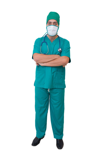 portrait of doctor in mask and green uniform isolated on white b - Фото, изображение