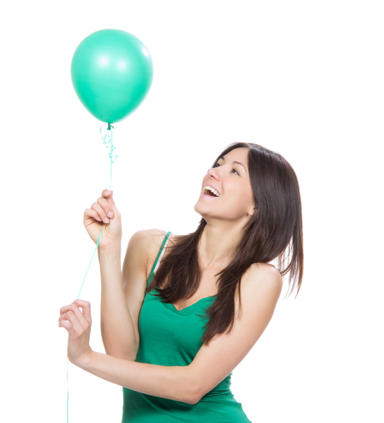 menina feliz com balão verde como um presente para a festa de aniversário
 - Foto, Imagem