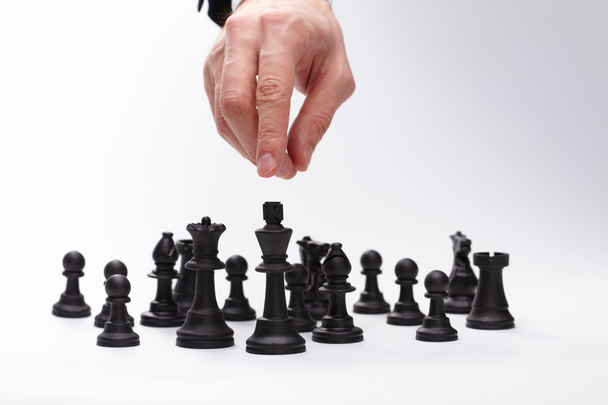 επιχείρηση άνθρωπος κινείται σχήμα σκάκι - Φωτογραφία, εικόνα