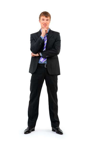 Full length of a smiling young businessman standing against isolated white - Foto, Imagem