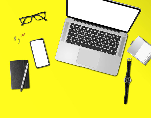 Office desk mockup top view isolated on yellow - Photo, image