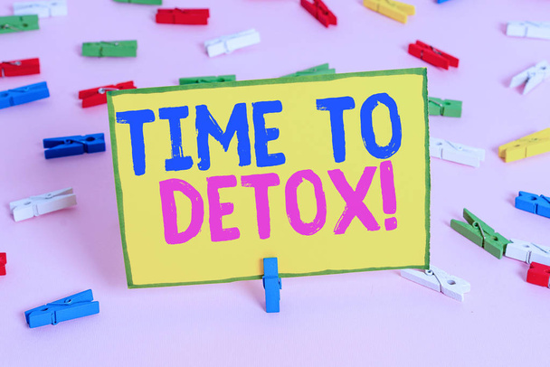 Word writing text Time To Detox. Business concept for when you purify your body of toxins or stop consuming drug Colored clothespin papers empty reminder pink floor background office pin. - Photo, Image