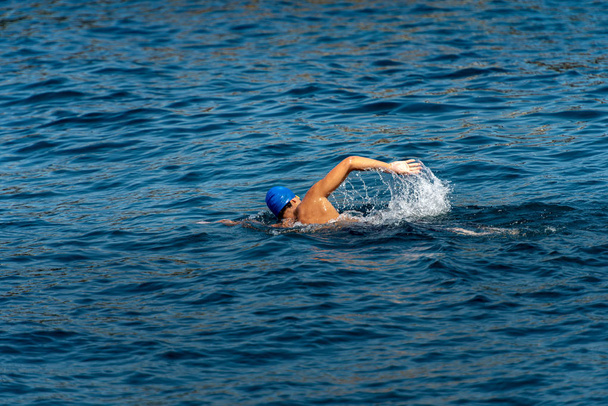 Freestyle swimmer in the sea - Front crawl - Photo, Image