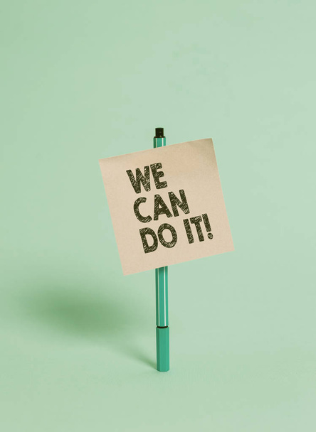 Handwriting text We Can Do It. Concept meaning see yourself as powerful capable demonstrating Ballpoint blank colored sticky note peaceful cool pastel fashion background. - Fotografie, Obrázek
