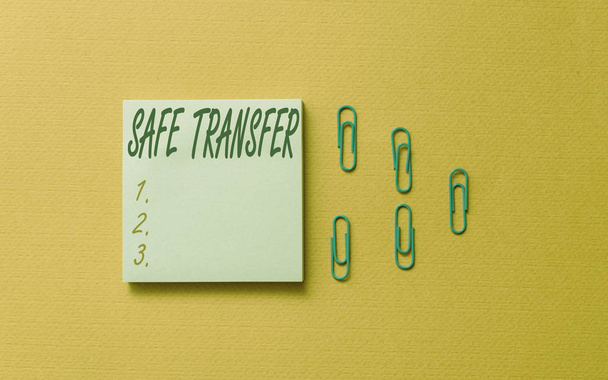 Writing note showing Safe Transfer. Business photo showcasing Wire Transfers electronically Not paper based Transaction Colored blank sticky note clips gathered trendy cool pastel background. - Photo, Image