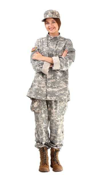 Young female soldier on white background - Zdjęcie, obraz