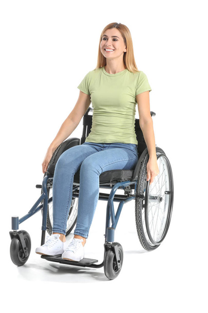 Piękna kobieta na wózku inwalidzkim na białym tle - Zdjęcie, obraz
