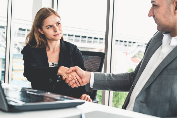 Businessman handshake businesswoman in office. - Φωτογραφία, εικόνα