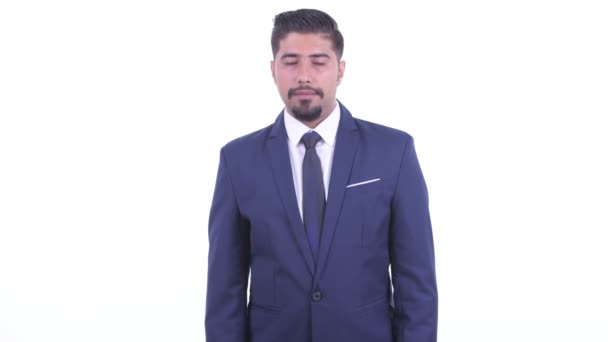 Щасливий бородатий персидський бізнесмен відпочиваючи з закритими очима - Кадри, відео