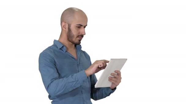Handsome arabic business man using tablet on white background. - Video, Çekim