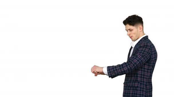 Young cool elegant man walking by on white background. - Footage, Video