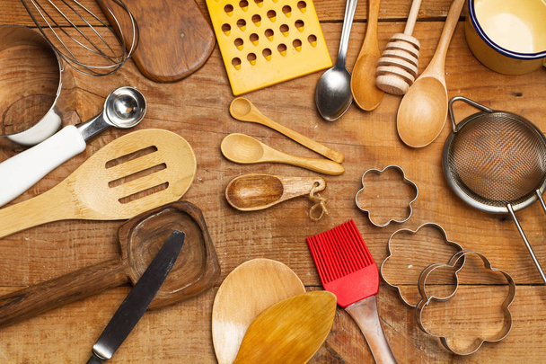 Kitchen utensils on a wooden table - Zdjęcie, obraz