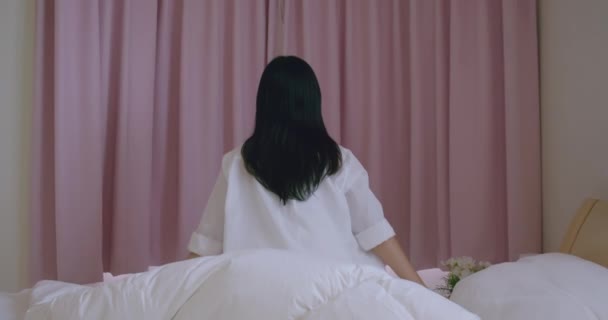 slow motion woman opening curtain - Video, Çekim