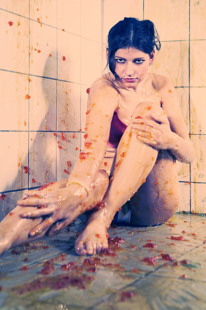 Young woman playing with melted Jelly - Foto, Imagen