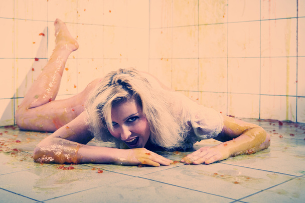 Young woman playing with melted Jelly - Foto, imagen