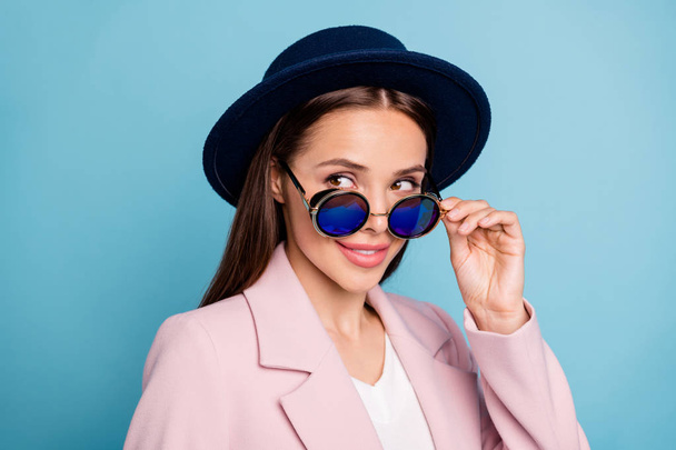 Close up photo of interested woman touch her retro vintage specs look want flirt handsome guy wear pink topcoat isolated over blue color background - Photo, Image