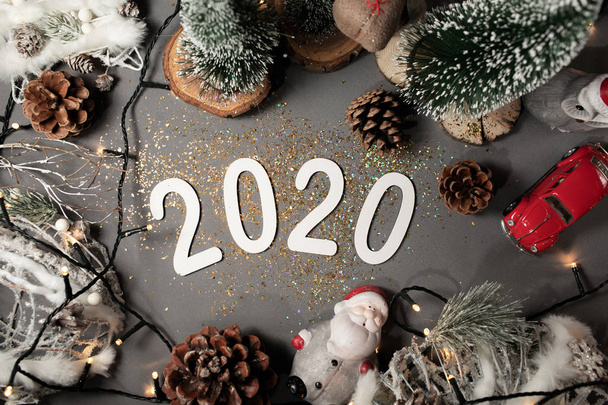 Hyvää uutta vuotta 2020. Symboli numerosta 2020 harmaalla pohjalla
 - Valokuva, kuva