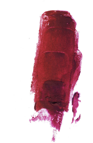 Frotis de lápiz labial de vino tinto aislado sobre fondo blanco
. - Foto, Imagen