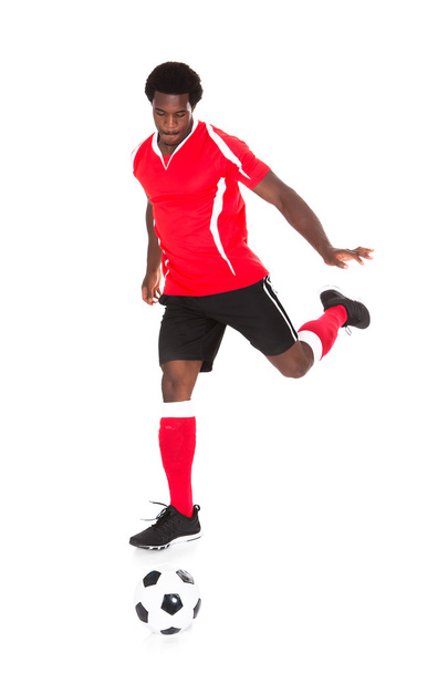 Soccer Player Kicking Football - Fotó, kép