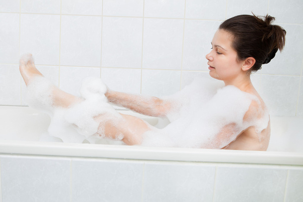 Woman in bathtub - Foto, Bild