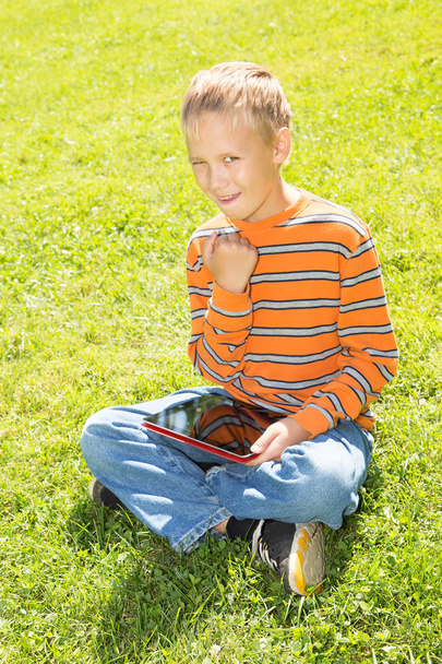 Boy with a Tablet Computer - Fotó, kép