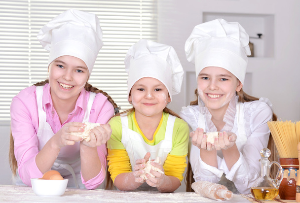 Cheerful girls cook - Photo, image