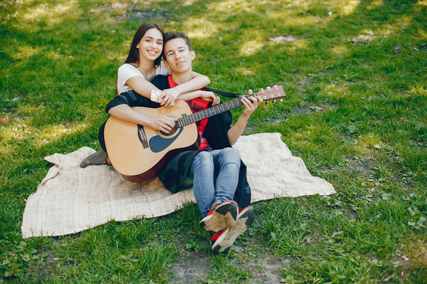 Couple with a guitar - Photo, image