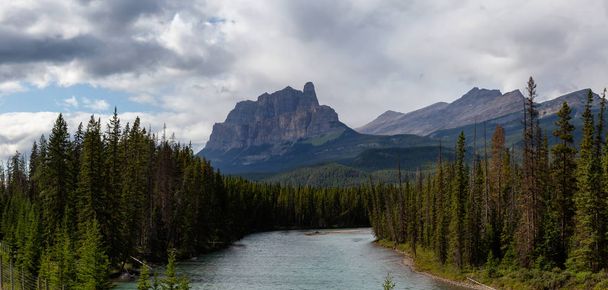 Beautiful Panoramic View of Canadian Mountain Landscape during a vibrant sunny summer day. Taken in Banff National Park, Alberta, Canada. - Photo, Image