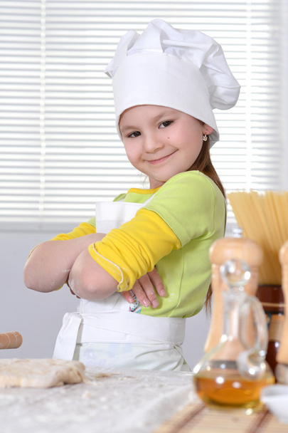 Nice girl in a hat chef - Fotoğraf, Görsel