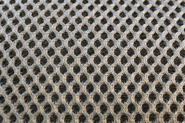 Delikli yakın çekim siyah kumaş dokusu - Fotoğraf, Görsel